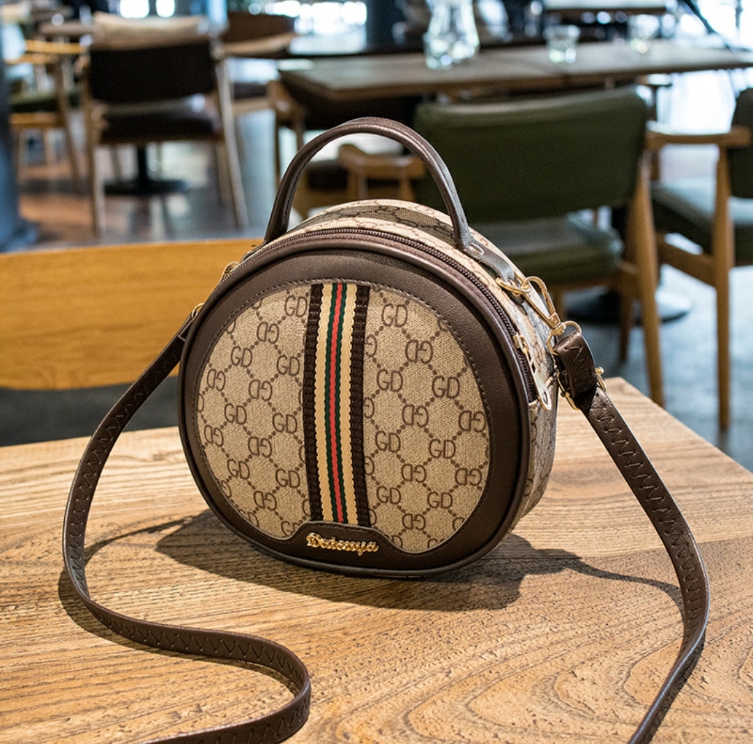 f-1 复古小圆饼包包